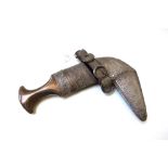 A presentation Middle Eastern Jambiya, with a shaped horn handle,