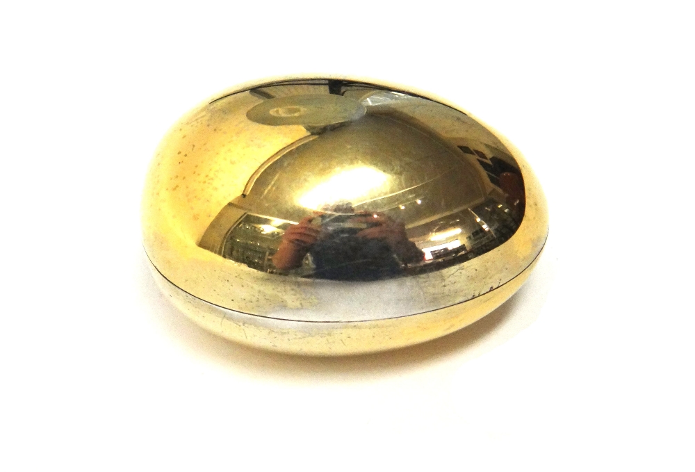 A silver gilt box and cover, of egg shaped form, by R.Comyns London 1968, weight 62gms.
