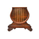 A Regency brass inlaid rosewood tea caddy of lyre shape,