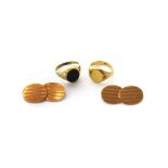 A pair of 9ct gold oval cufflinks, the backs and the fronts with banded decoration, Birmingham 1945,