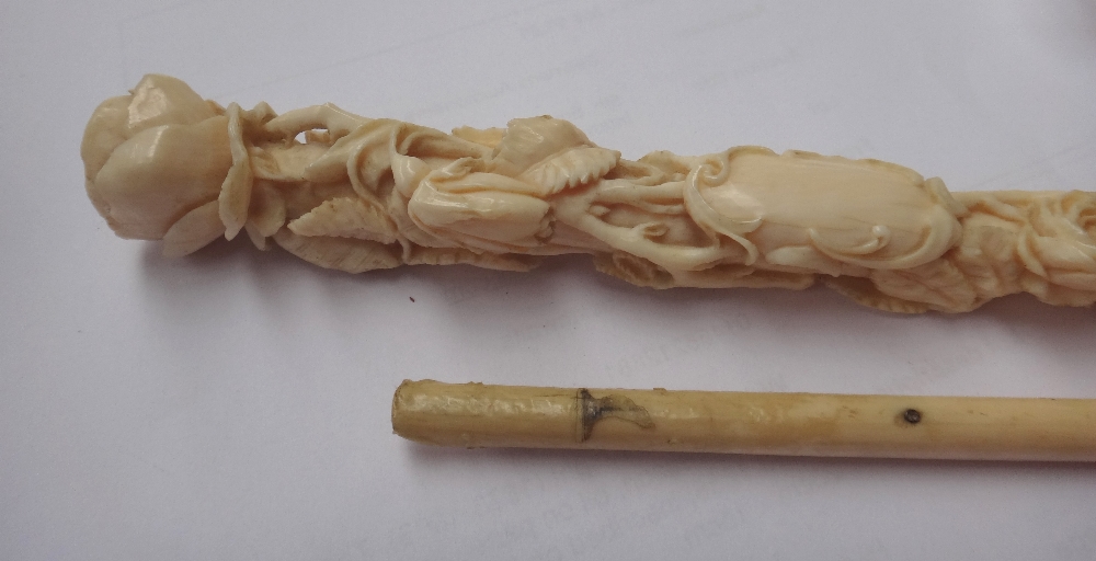 A Japanese ivory parasol handle, early 20th century, with carved foliate decoration and signature, - Image 10 of 12