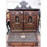 A mid 19th century Italian copper, pewter and mother of pearl inlaid walnut table top cabinet,
