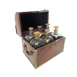 A 19th century French brass bound mahogany dome top six decanter box, 26cm wide.