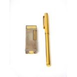 A gilt metal Dunhill rectangular gas lighter,