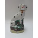 A quantity of 19th century porcelain and pottery animals, including; a pair of Derby sheep,