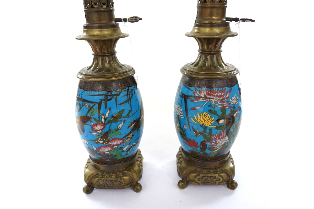 A pair of Japanese cloisonne and brass mounted oil lamps, 20th century,