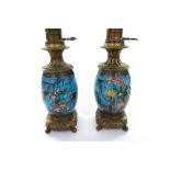 A pair of Japanese cloisonne and brass mounted oil lamps, 20th century,