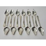 A set of twelve silver grapefruit spoons, having shaped handles, Sheffield 1971,