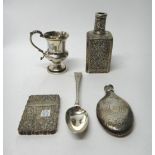 A Victorian silver spirit flask of oval form, with engraved decoration,