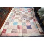 An early Victorian printed cotton patchwork quilt, mid-19th century,