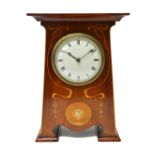 A marquetry and mother of pearl inlaid mahogany Art Nouveau mantel clock,
