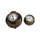 A Regency style brass cased cased sedan clock with later movement, 7cm diameter,