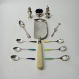 Three silver condiments, including a pepperette, Birmingham 1904, a plated crumb scoop,