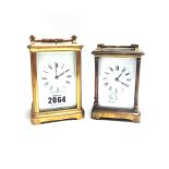 A gilt brass cased carriage clock, early 20th century, with white enamel dial,
