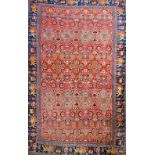 A Bidjar carpet, Persian, the madder field with rows of foliate quatrefoil medallions,