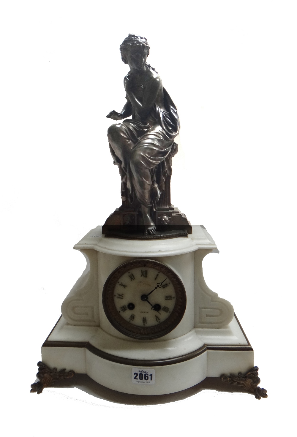 A Napoleon III bronze and white marble striking mantel clock, H.
