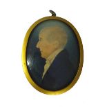 English School, early 19th century, portrait miniature profile of a gentleman facing the left,