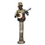 A glazed earthenware banjo player in the manner of Pietro Calvi (1833-1884), Carrara marble plinth,