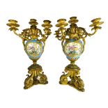 A pair of French ormolu mounted Sevres style porcelain five light candelabra, late 19th century,
