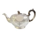 A Victorian silver teapot, of compressed circular form, with floral,