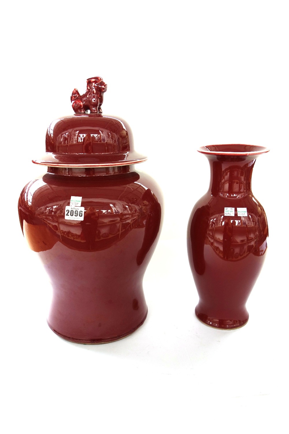 A pair of modern Chinese temple vases and covers of baluster form,