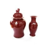 A pair of modern Chinese temple vases and covers of baluster form,