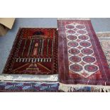 An Afghan rug, the madder field with a mosque, 105 x 80cm, an Afghan belouch rug,