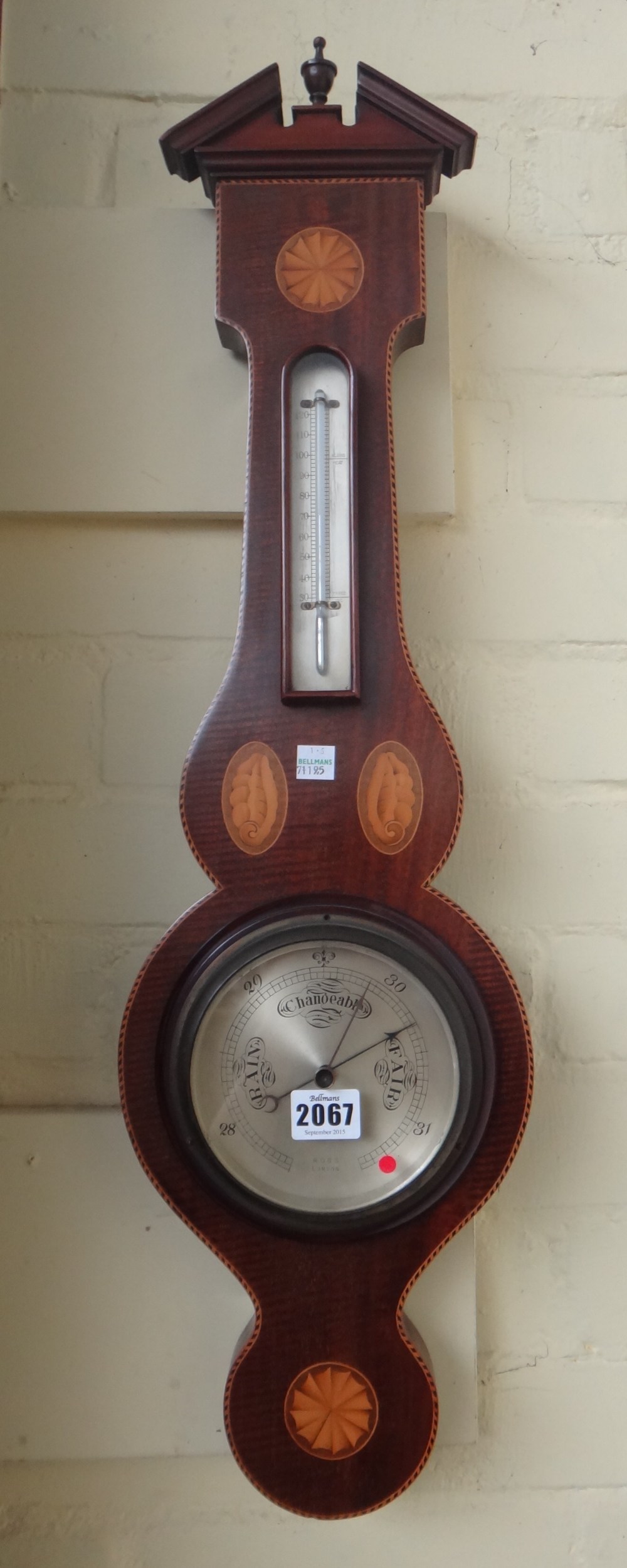 An Edwardian wheel barometer by Ross London,