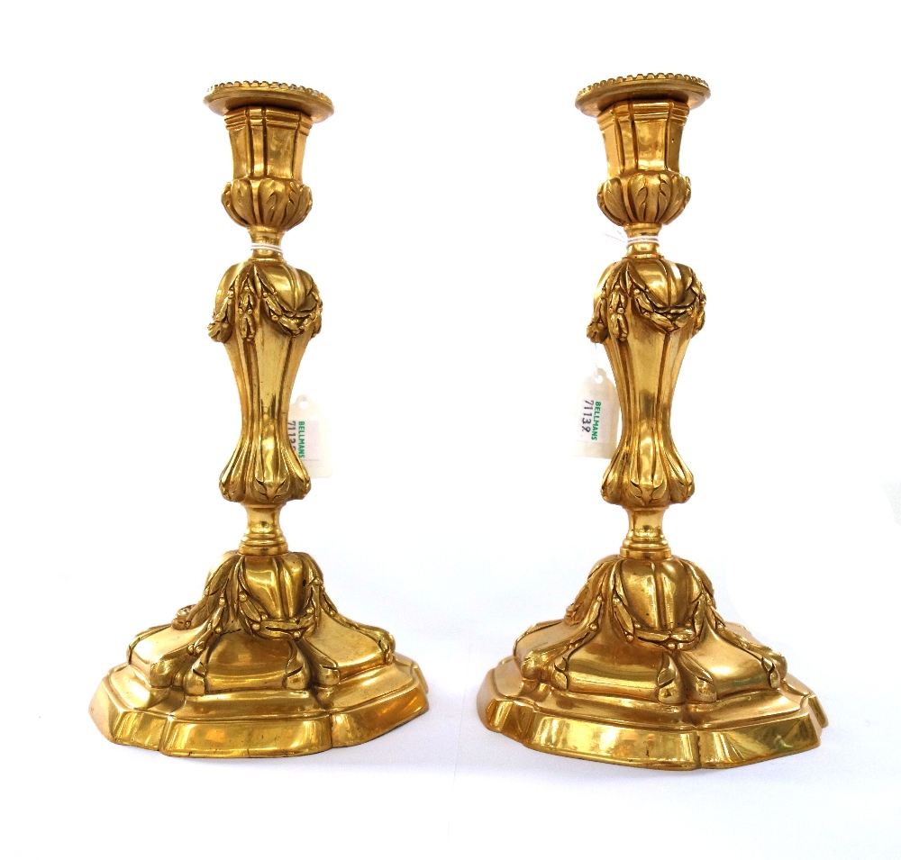 A pair of Georgian style gilt bronze candlesticks, modern, with foliate cast decoration, - Image 2 of 2