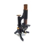 A Swift & Son ebonised brass microscope, early 20th century, in a fitted mahogany case,