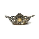 A German silver gilt twin handled bonbon basket,