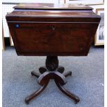 An early 19th century crossbanded mahogany cellarette of sarcophagus form,