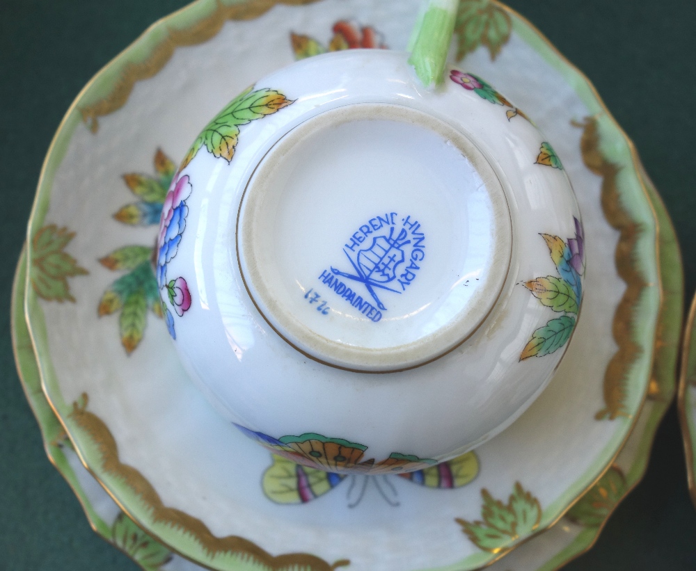 A Herend porcelain part tea service decorated with butterflies against a gilt green ground, - Image 2 of 5