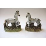 A pair of Staffordshire flat back zebras, early 20th century,