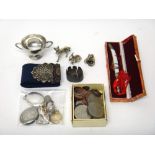 A Victorian tape measure, of acorn form, with engraved decoration, a silver postage stamp's case,