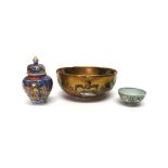 A Japanese satsuma bowl, Meiji period, the interior moulded and painted with arhats and a dragon,