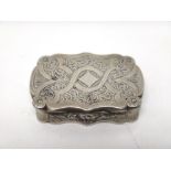 A Victorian silver shaped rectangular vinaigrette, with a scroll pierced and engraved grille,
