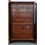 A George III mahogany chest on chest of two short and two long graduated drawers over two short and