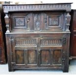 A 17th century oak court cupboard,