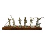 A group of six modern silver models of game sportsman, including; shooting, falconry and fishing,