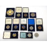 Seven silver and four bronze medallions, mostly relating to horticulture,