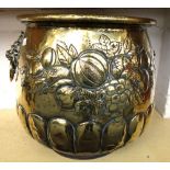 An embossed brass coal bin, early 19th century,