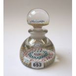 A glass inkwell with millefiori cane inclusions, 20th century,with domed stopper and body, 14.