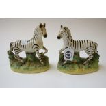 A pair of Staffordshire flat back zebras, early 20th century,