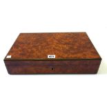 A 20th century Dunhill amboyna humidor with inlaid rounded corners, 40cm wide.