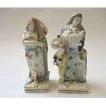 Two Staffordshire pearlware figures of Hope and Charity, circa 1800,