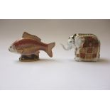 A Royal Crown Derby porcelain Imari paperweight modelled as an elephant and another modelled as a