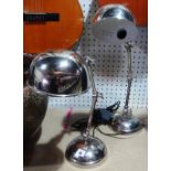 A pair of 20th century chrome angle poise desk lamps.