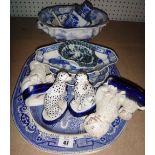 A quantity of English and Continental blue and white pottery,