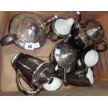 A silver lustre porcelain tea set.